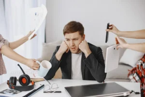 Persona con estrés y sobrecarga en el trabajo, relacionado con baja por ansiedad